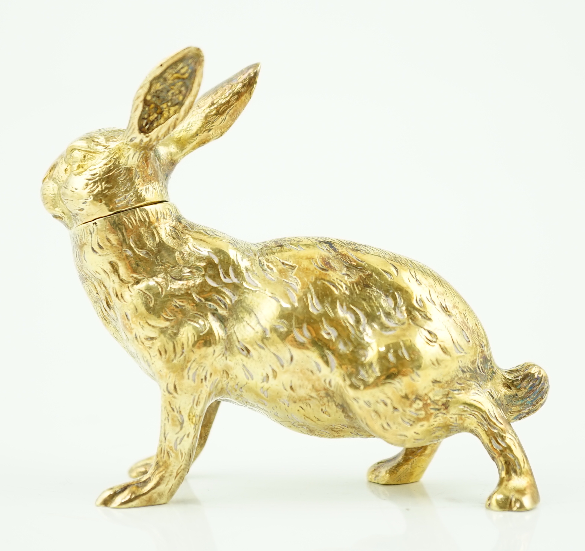 An early 20th century German novelty 800 standard silver gilt pepperette, modelled as a rabbit